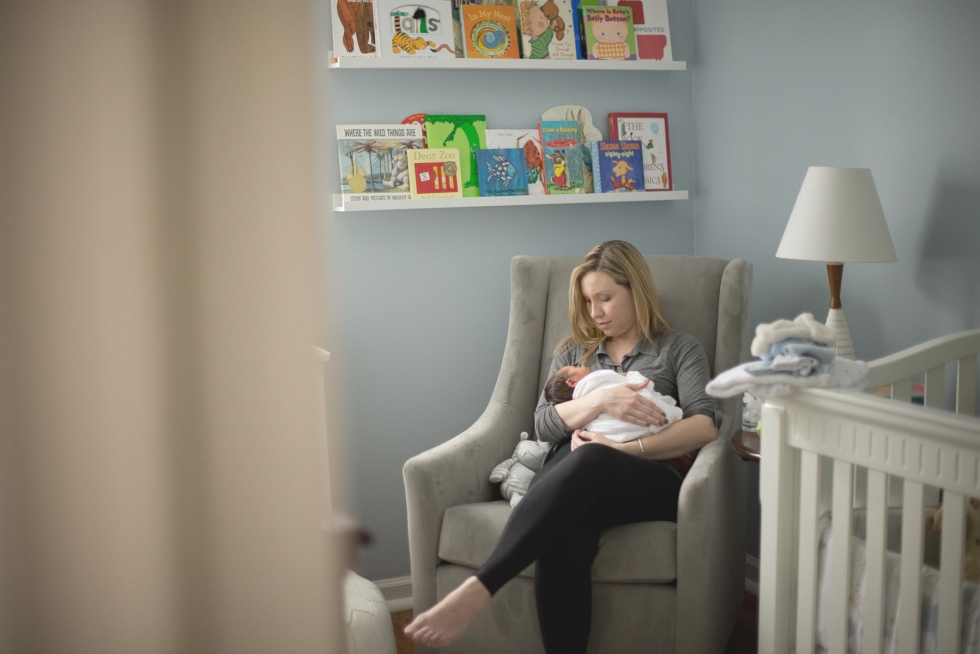 Mom in nursery with newborn